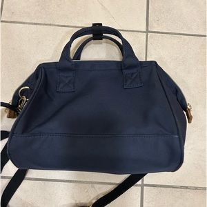 Small bag with straps, dark blue color, Used but still in good condition